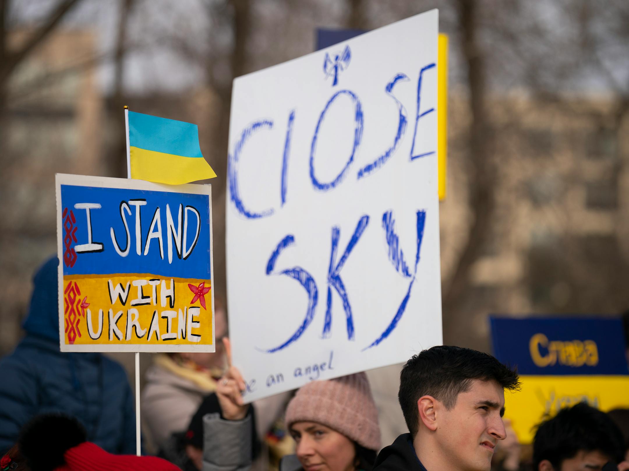 Ukraine supporters paused on the Stone Arch Bridge to listen to speakers before meeting a group of Belarusians in a march to show support for Ukraine Sunday afternoon, February 27, 2022 in Minneapolis, Minn. Hundreds of supporters of the people of Ukraine met a few dozen supporters of the Belarusian people midway across the Stone Arch Bridge in Minneapolis before continuing on a march together across the Hennepin Ave. bridge to Northeast Minneapolis where the march first began. ] JEFF WHEELER • Jeff.Wheeler@startribune.com