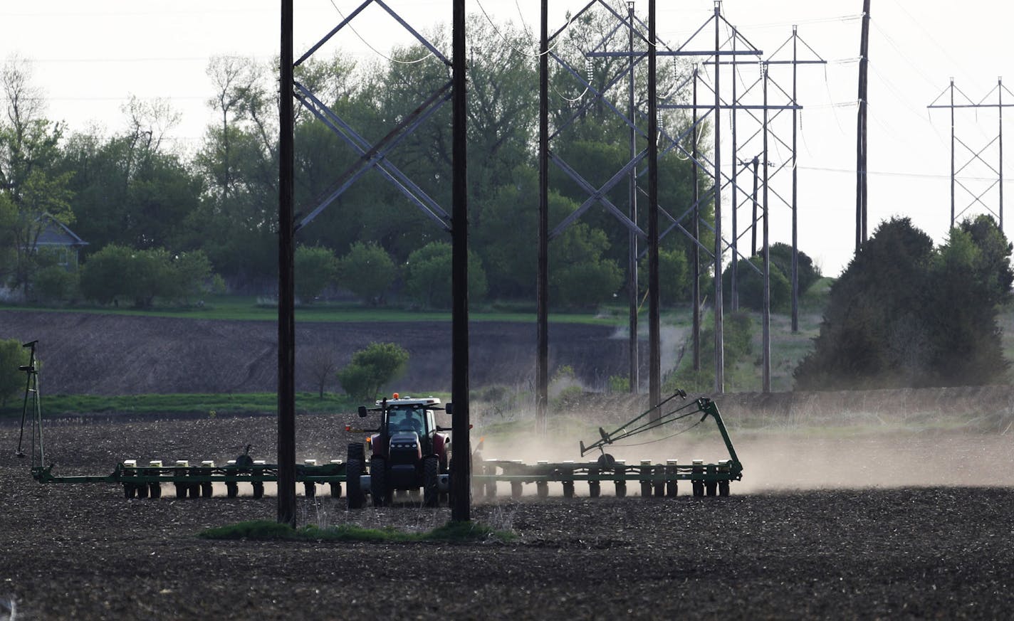 New data shows farm bankruptcies rose last year. Credit for farmers this year is shaping up to be tighter as well. File photo of a farmer planting soybeans near Lake Benton, Minn.