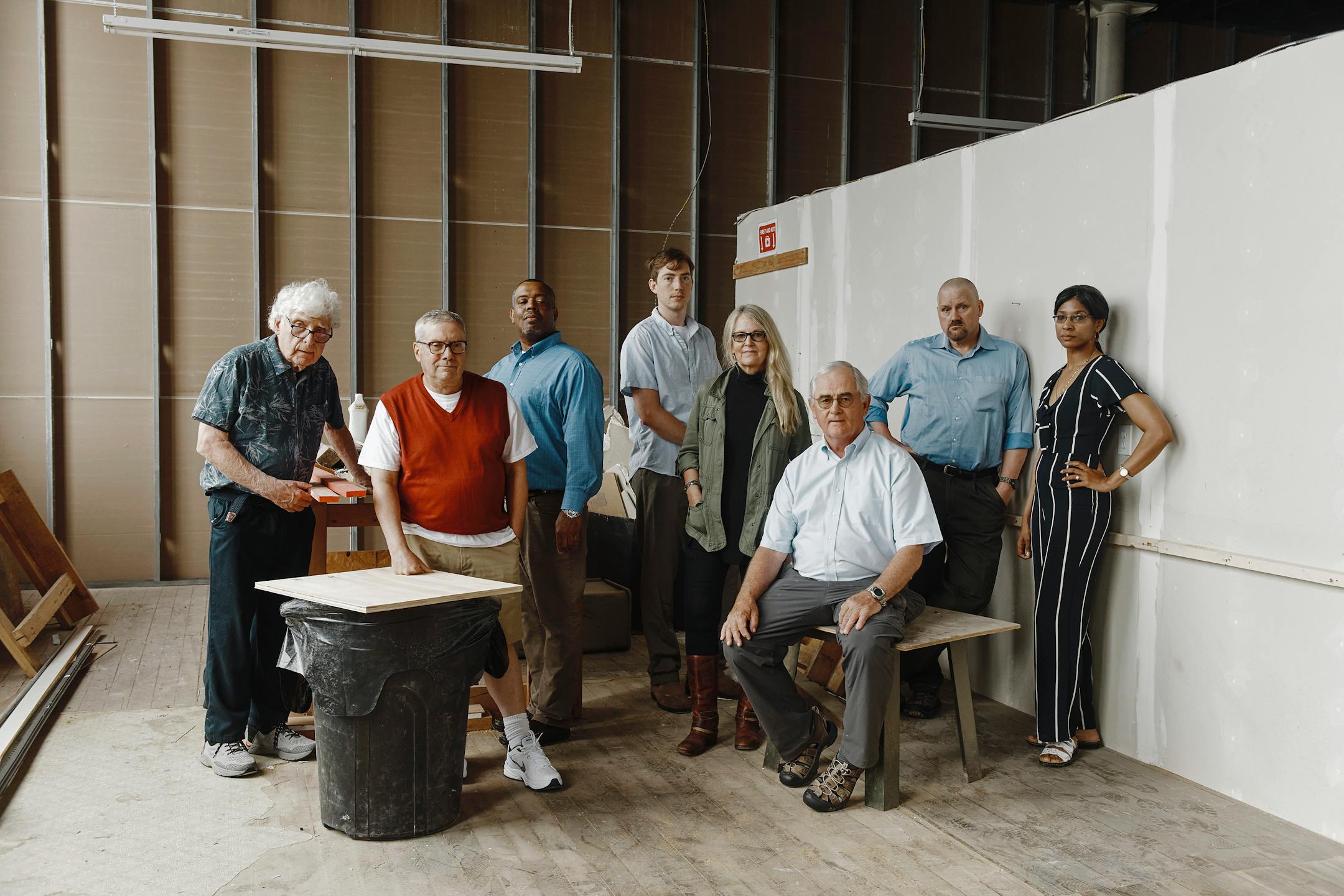 Staff members of The New Bedford Light, from left, Ken Hartnett, Jack Spillane, Peter Andrews, Will Sennott, Barbara Roessner, Stephen Taylor, Andy Tomolonis and Toni Delgado-Green in their newsroom in New Bedford, Mass., which is still under construction, on June 14, 2021. An ambitious news site, The New Bedford Light, has sprung up in an old New England whaling town to fill a void in coverage. (Tony Luong/The New York Times)