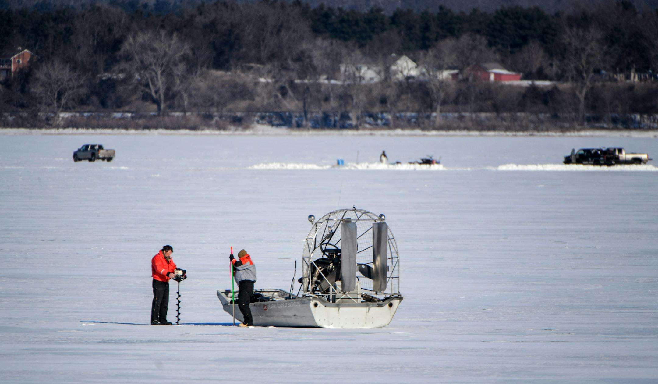 The U.S. Army Corps of Engineers crew drilled a hole in the navigation channel on the frozen Lake Pepin. Fishermen worked in the background. ] GLEN STUBBE * gstubbe@startribune.com Wednesday, February 17, 2016 A team from the U.S. Army Corps of Engineers tested the ice thickness on Lake Pepin, trying to get an estimate for when the first towboat might break through to St. Paul to open the season.