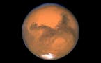This Aug. 26, 2003 image made available by NASA shows Mars photographed by the Hubble Space Telescope on the planet's closest approach to Earth in 60,