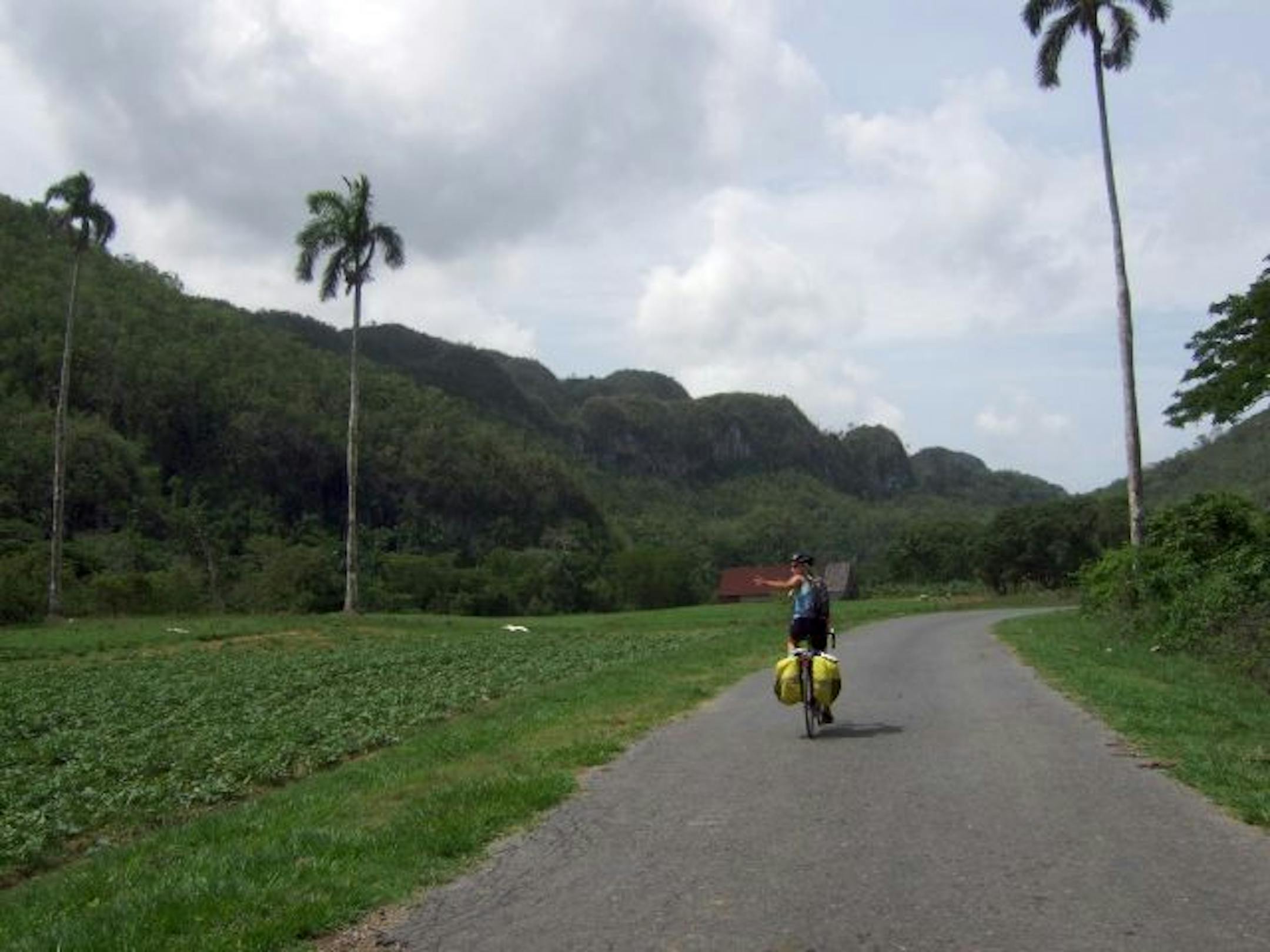 The road through the Cuban mountains in Pinar del Rio. Cuba is a cyclist's paradise: Many roads are empty, and even on the busiest highways, drivers are used to sharing with bikes, pedestrians, horses, mules and anything else that can roll or walk. Illustrates TRAVEL-CUBA (category t), by Emma Brown and Jacob Fenston (c) 2009, The Washington Post. Moved Tuesday, Sept. 22, 2009.