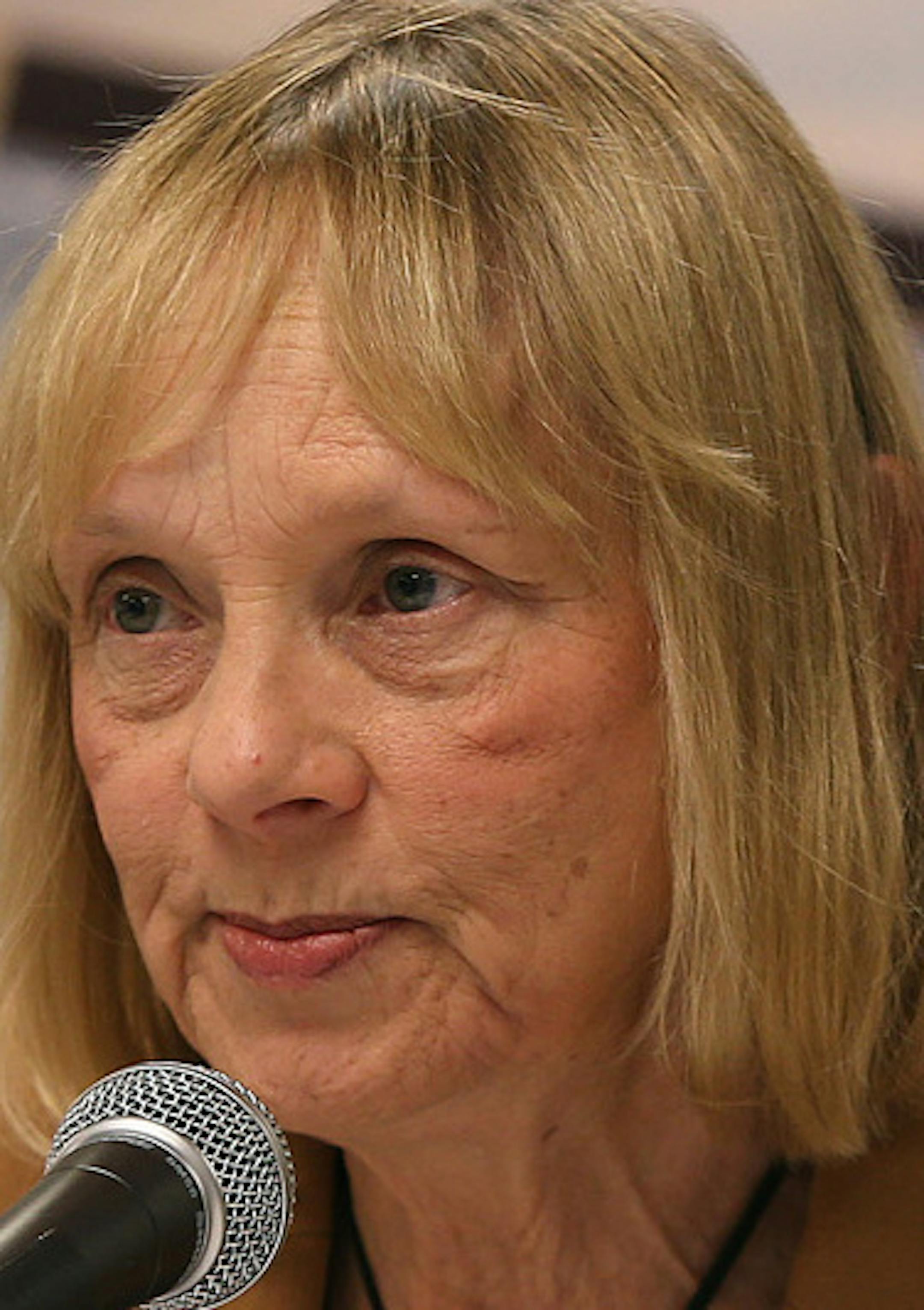 Michele Kelm-Helgen, of the Minnesota Sports Facilities Authority led a hearing, Friday, November 22, 2013 at the Mall of America Field Halsey Room in Minneapolis, MN. They considered and agreed on the "guaranteed maximum price" for construction costs. This agreement will determine what perks are in, and what perks are out, of the stadium project. (ELIZABETH FLORES/STAR TRIBUNE) ELIZABETH FLORES • eflores@startribune.com ORG XMIT: MIN1311221106581481