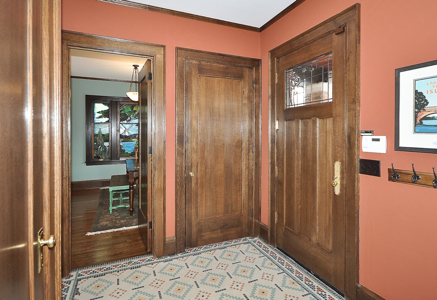 The new rear entry porch opens to the mudroom addition, with tile matching the home&#x2019;s foyer.