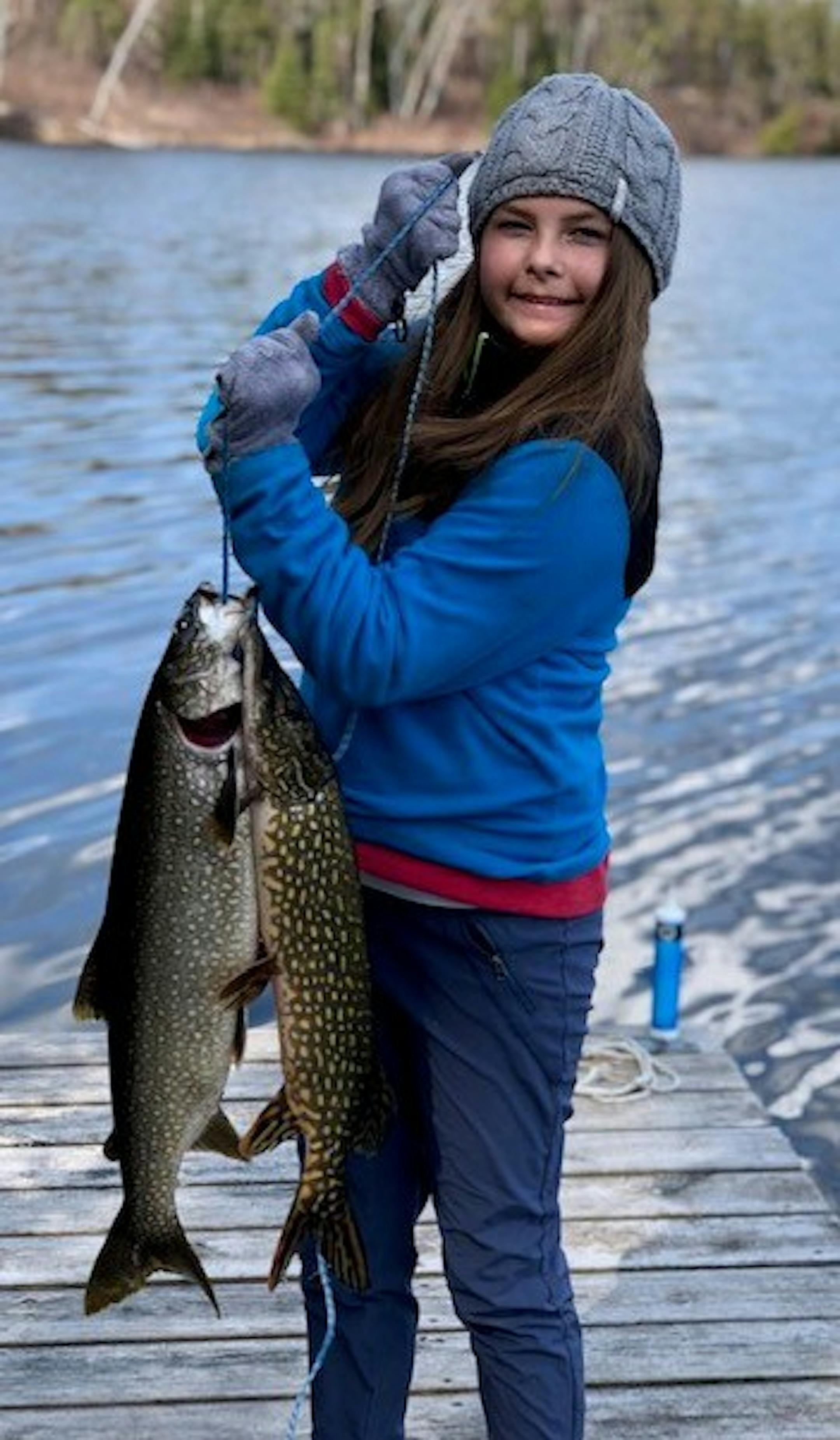 Addie LaFave, age 11, of Minneapolis, caught a 7-pound lake trout and 4-pound pike on Manitou Lake fishing with her dad.