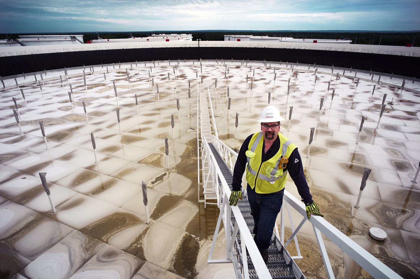 Tom Peterson, supervisor of the Enbridge terminal site shows where oil from Canada and North Dakota is stored and is directed to its final destination.]Enbridge already has started building the 14-mile stretch of Line 3 from the Minnesota line to its terminal in Superior, Wis.Richard Tsong-Taatarii • richard.tsong-taatarii@startribune.com ORG XMIT: MIN1708292147474095