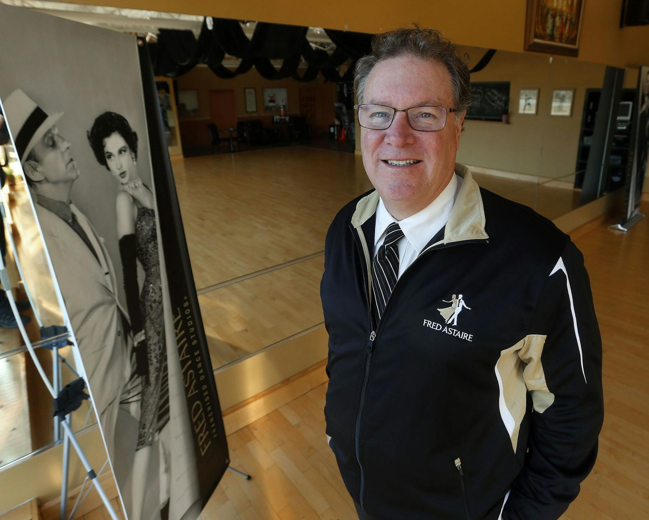 Evan Mountain, owner of Fred Astaire Dance Studio, poses in Bloomfield Hills, Mich., Wednesday, Jan. 6, 2016. Mountain expects business at his dance studio in suburban Detroit to grow in 2016 along with the auto industry. (AP Photo/Paul Sancya) ORG XMIT: MIPS101