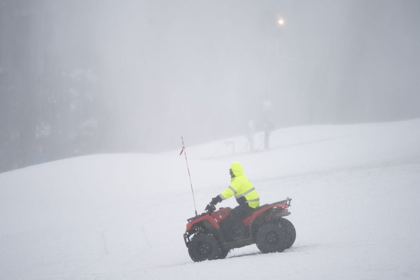 Maintenance crew member Craig Lee rode an ATV to check on the snow-making equipment at Hyland Hills Ski Area on Tuesday afternoon.