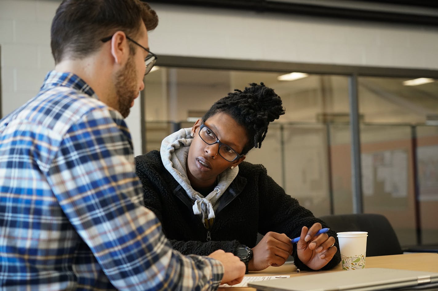 Alex Giesen (left) and Satoria Moran, 24, met at the New Hope YMCA to catch up and fill out paperwork to apply for a membership to the club, one of the goals in the Y&#x2019;s Intervention Services program, which helps teens and young adults at risk of homelessness. The Y got a grant from the Constellation Fund to expand the program. ] Shari L. Gross &#x2022; shari.gross@startribune.com