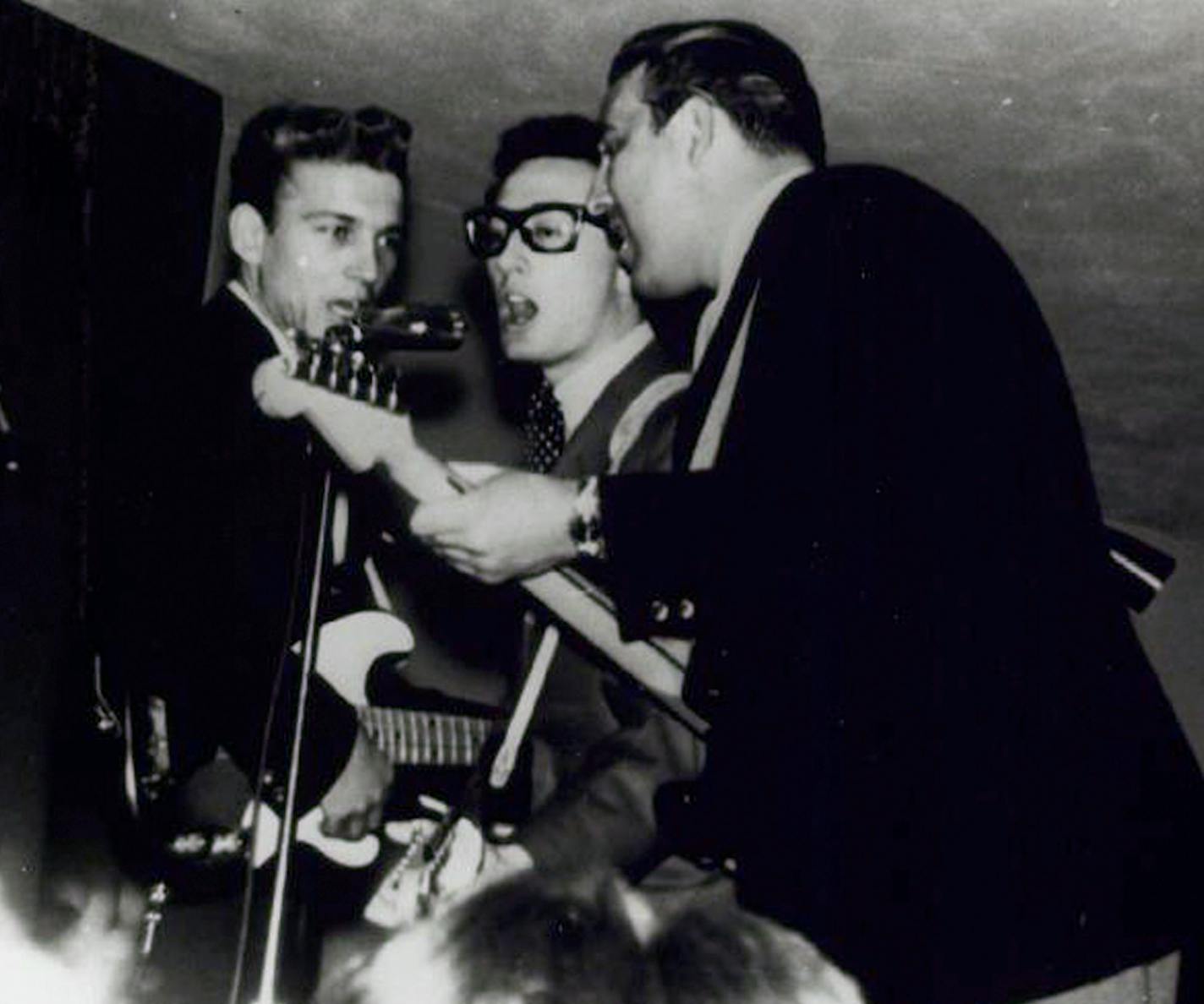 Buddy Holly performing with Waylon Jennings and Tommy Allsup at the Fiesta Ballroom, Montevideo, on Jan. 27, 1959.