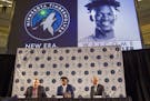 Timberwolves new forward Jimmy Butler, center, is joined by Timberwolves head coach Tom Thibodeau, left, and General Manager Scott Layden
