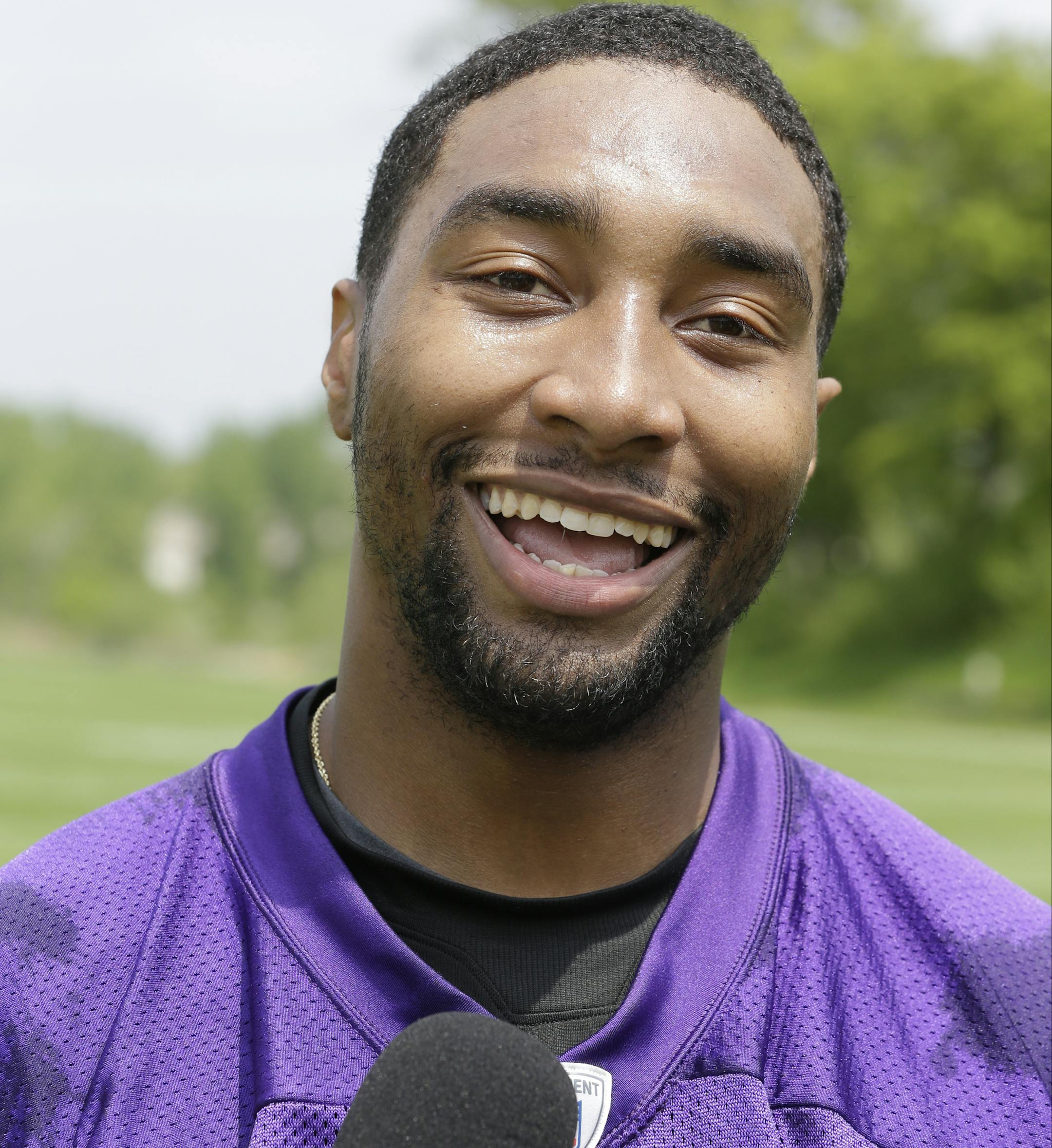 Minnesota Vikings wide receiver Joe Webb talks with reporters after Organized Team Activities (OTA) Wednesday, May 29, 2013 in Eden Prairie, Minn. (AP Photo/Jim Mone)