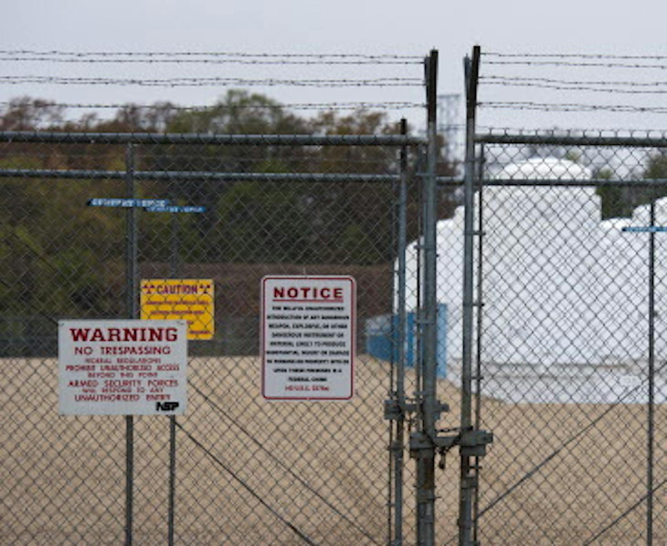 Spent nuclear fuel rods are stored behind a double chain link fence in these casks. The Xcel Energy Prairie Island Nuclear Plant north of Red Wing is looking to boost electrical output at the plant. Tuesday, October 9, 2012 ] GLEN STUBBE * gstubbe@startribune.com ORG XMIT: MIN1210091609403011