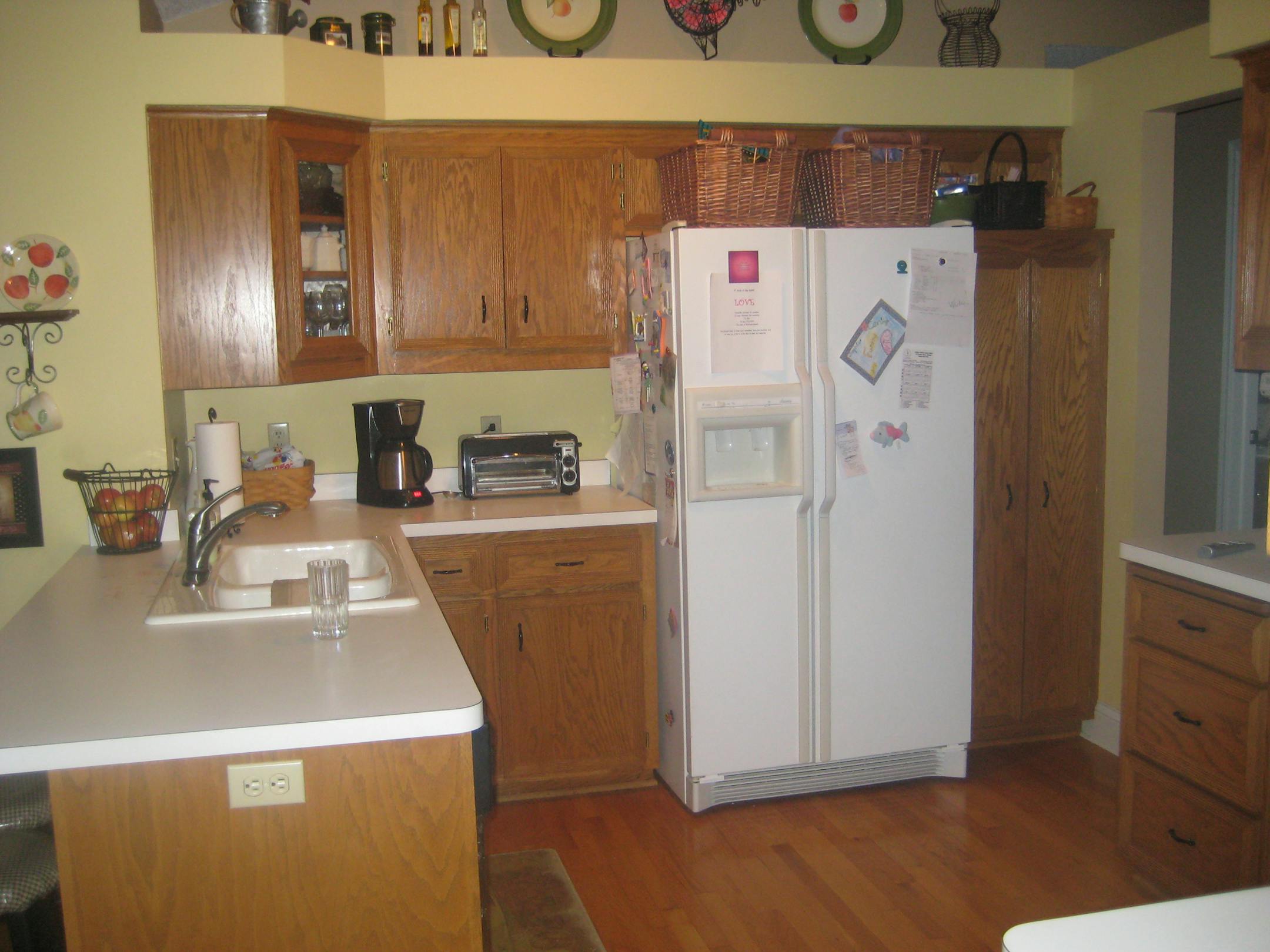 Before: The kitchen was a little dated and cut off from dining room.