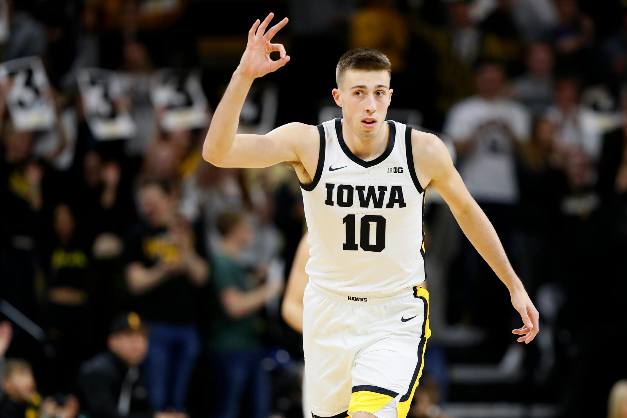 Iowa guard Joe Wieskamp celebrates after making a three-point basket during the first half of an NCAA college basketball game against Minnesota, Monday, Dec. 9, 2019, in Iowa City, Iowa. (AP Photo/Charlie Neibergall)