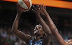 Center Sylvia Fowles (shown in a July 25 game against the New York Liberty) scored 29 points and added 12 rebounds to lead the Lynx past Seattle 93-82