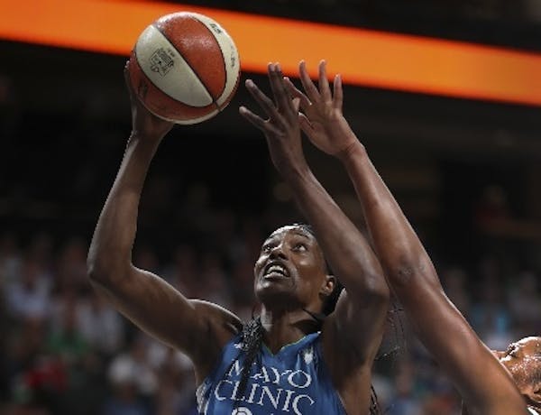 Center Sylvia Fowles (shown in a July 25 game against the New York Liberty) scored 29 points and added 12 rebounds to lead the Lynx past Seattle 93-82