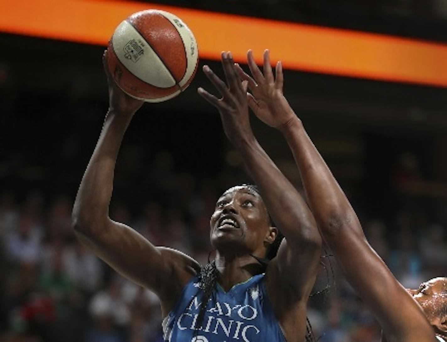 Center Sylvia Fowles (shown in a July 25 game against the New York Liberty) scored 29 points and added 12 rebounds to lead the Lynx past Seattle 93-82 on Sunday.