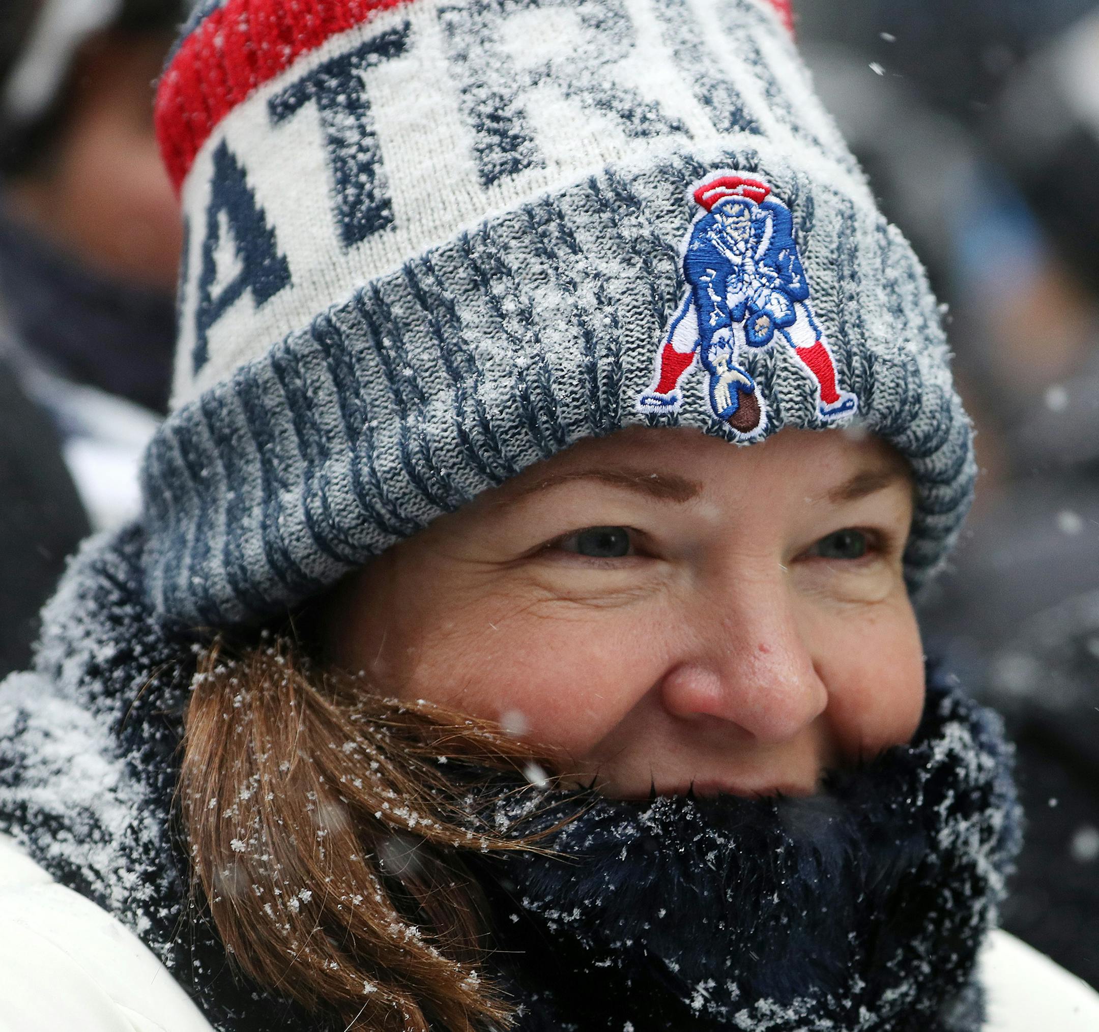 Kerri Hanson of Seaton, Fla. stood bundled up in Patriots gear during the team's rally Saturday on Nicollet Mall. ] ANTHONY SOUFFLE &#xef; anthony.souffle@startribune.com Super Bowl Live attendees took part in Saturday's festivities including an Eagles and Patriots rally as well as the Polaris UpsideDown stunt where Levi LaValle leapt a snowmobile over Nicollet Mall Saturday, Feb. 3, in downtown Minneapolis.