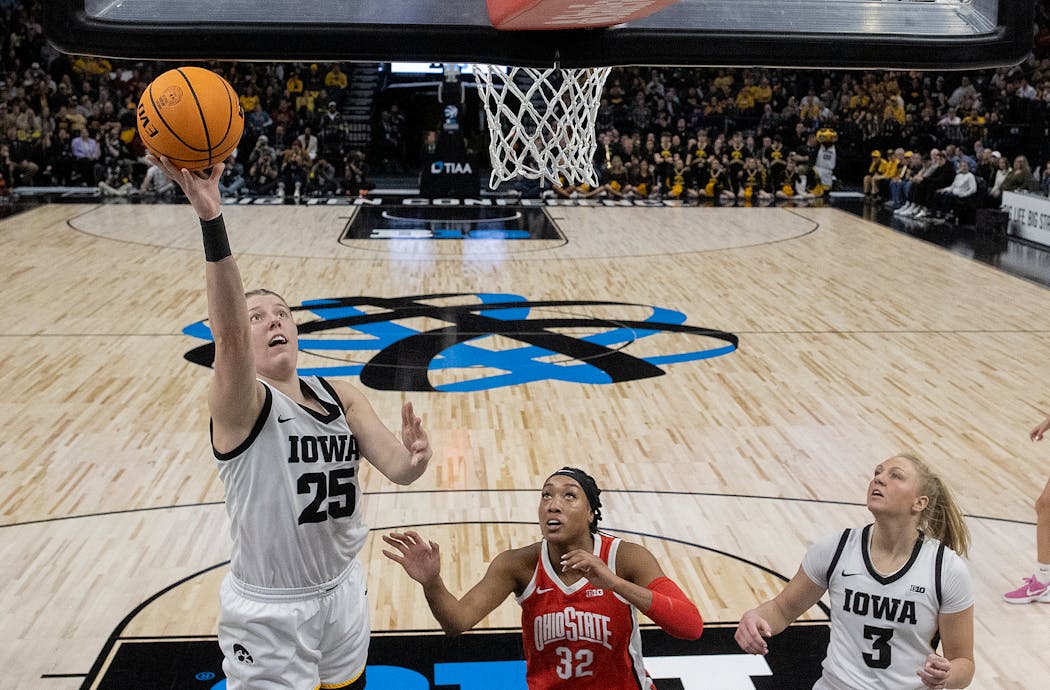 Monika Czinano (25) scored two of her 26 points in Sunday’s Big Ten championship game win for Iowa against Ohio State.