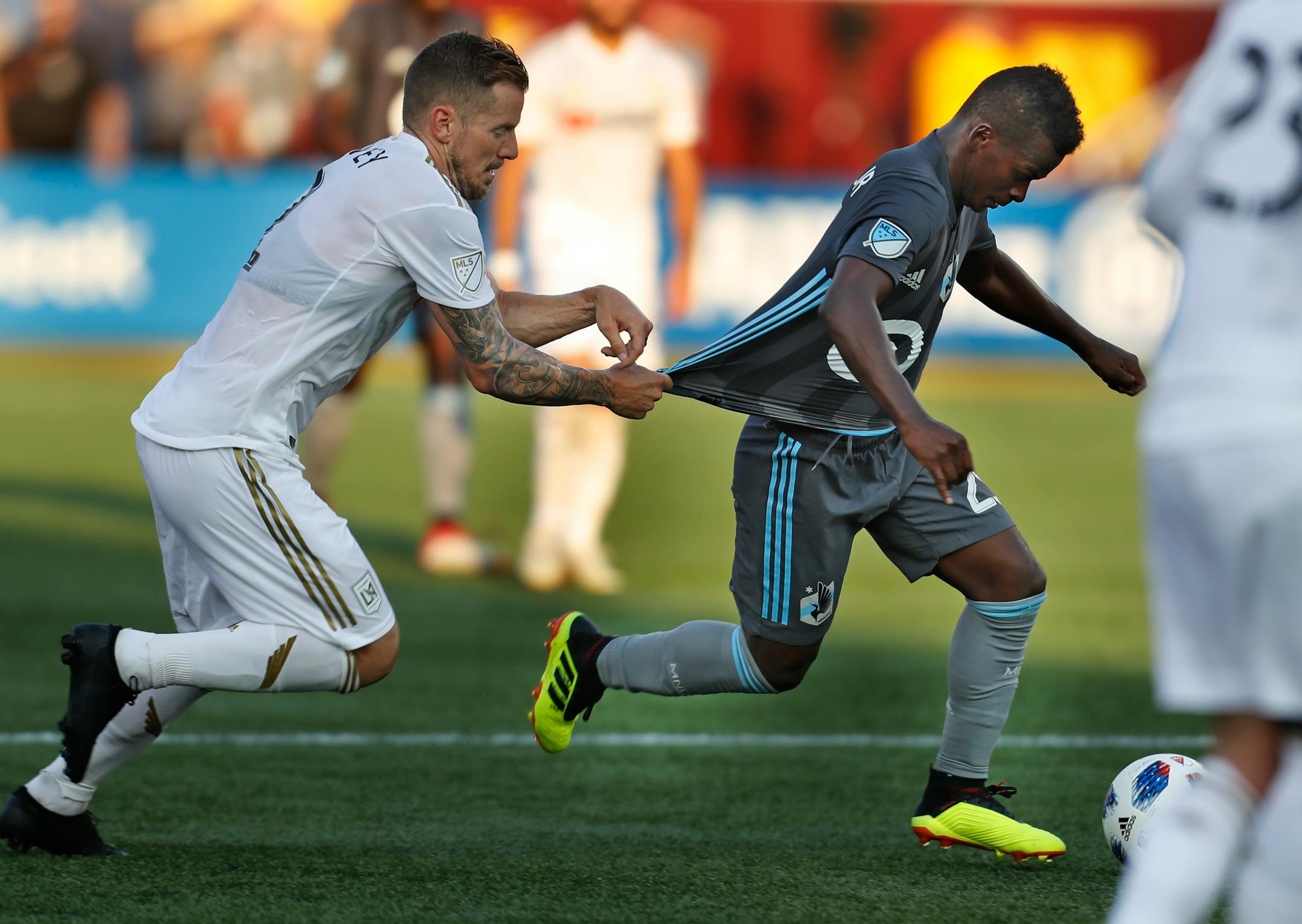 Minnesota United forward Darwin Quintero went on the attack and was fouled by LAFC's Jordan Harvey. Quintero scored a goal and had two assists in the Loons' 5-1 rout of LAFC at TCF Bank Stadium on Sunday.