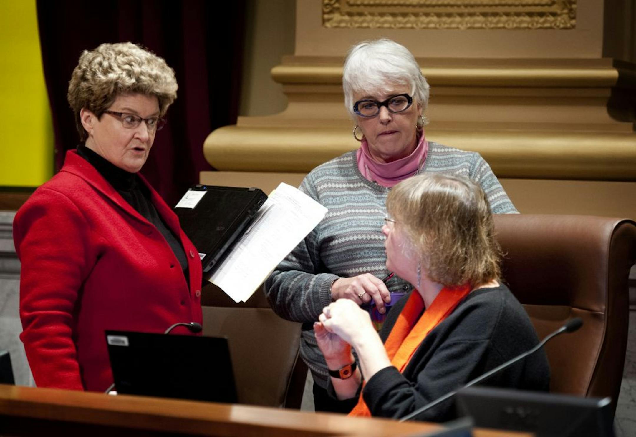 Minneapolis City Council members Barbara Johnson, Meg Tuthill, Lisa Goodman spoke at the end of a city council meeting. Thursday, February 23, 2012