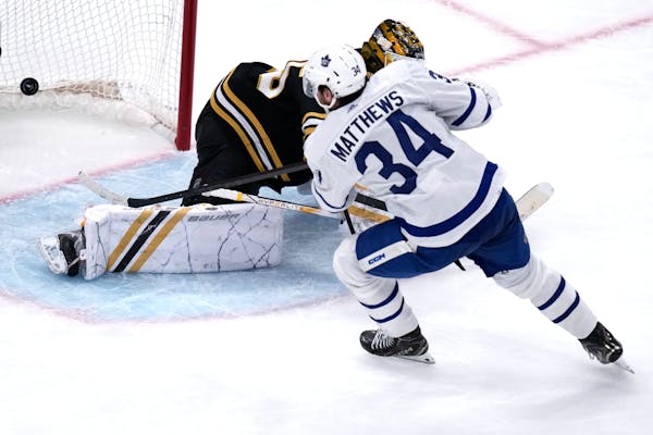 Toronto Maple Leafs center Auston Matthews (34) beats Boston Bruins goaltender Linus Ullmark for a goal during the third period of Game 2 of their fir