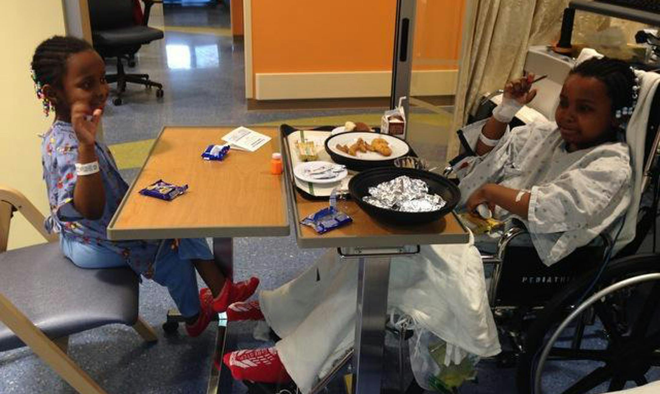 Feb. 26, 2014: Five-year-old Electra, left, and 9-year-old Shaca were told two days ago about the deaths of their five brothers and sisters, Troy Lewis said.