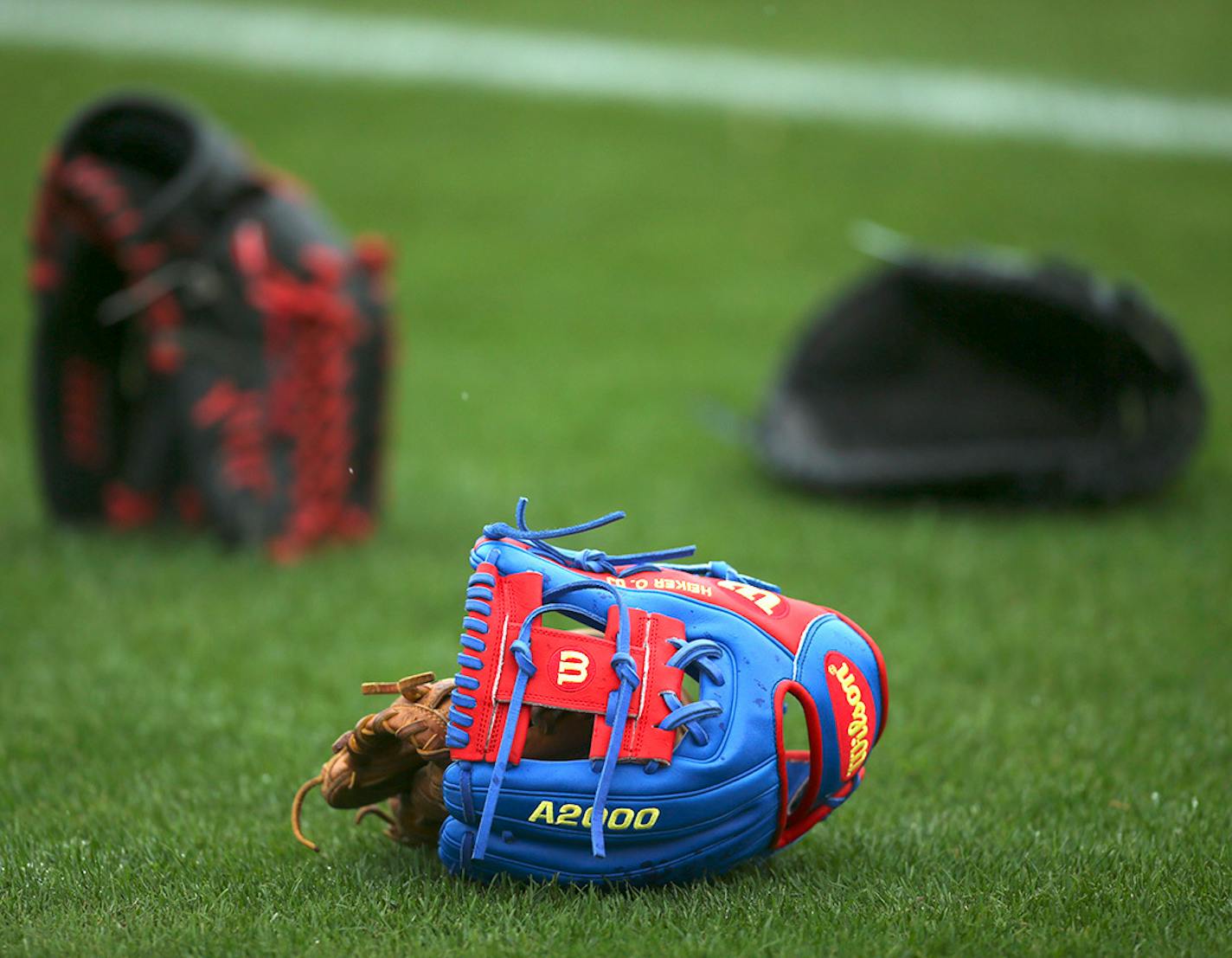 Minor-league infielder Heiker Meneses' glove stood out among the others as the players stretched before a spring training workout in Fort Myers.