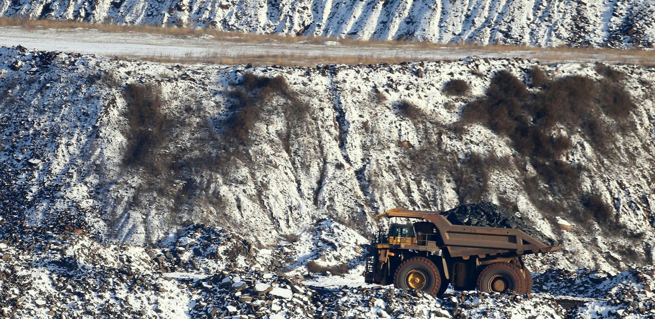 A view of Hull Rust Mine: the world's largest open pit mine, where a giant truck is seen carrying iron ore rocks Tuesday, Nov. 24, 2015, in Hibbing, MN.](DAVID JOLES/STARTRIBUNE)djoles@startribune.com Idled on the Iron Range, workers and entire communities are struggling at a time when the rest of Minnesota is enjoying peace and plenty. The Range has always been a land of booms and busts, but the latest downturn has stretched on so long the governor is calling for a special session to extend une
