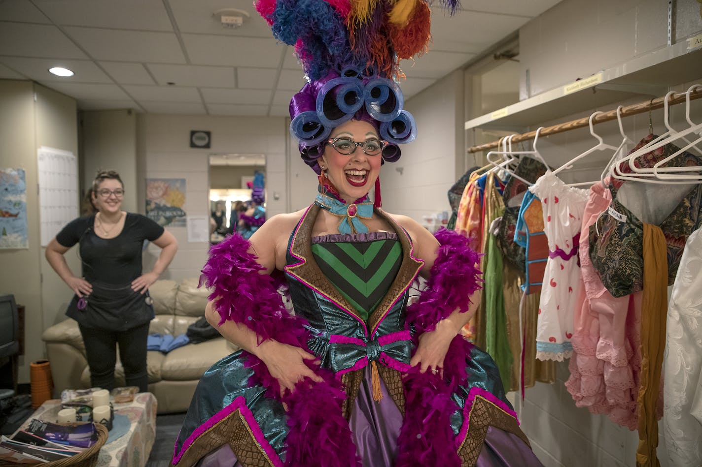 Children's Theatre Company's Andi Soehren, cq, tightened a corset onto actor Autumn Ness as they got ready in the dressing room for a dress rehearsal for the Theatre's production of "Cinderella," Friday, November 1, 2019. ] ELIZABETH FLORES &#x2022; liz.flores@startribune.com