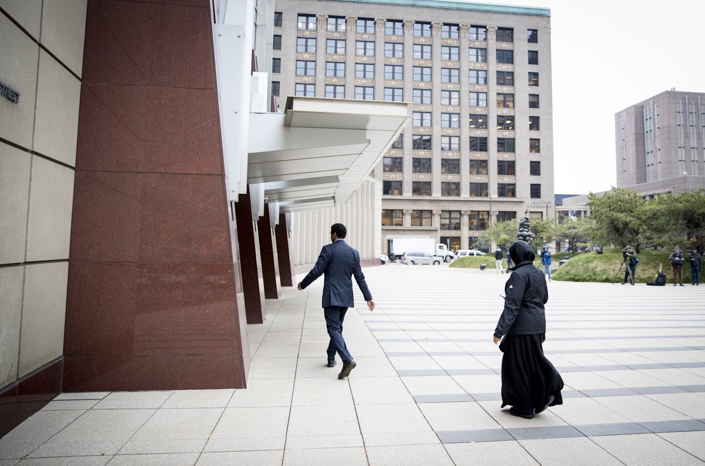 People walked into the Federal Courthouse before the sentencing for three of the nine ISIL recruit defendants on Monday, November 14, 2016, in Minneapolis, Minn.