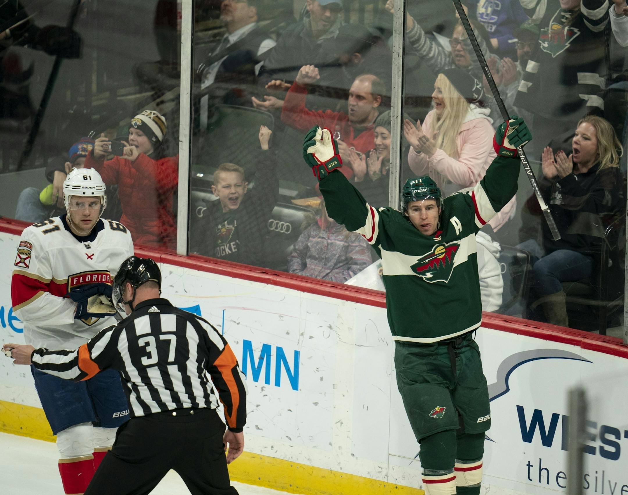 Wild left wing Zach Parise celebrated his third-period goal vs. Florida.