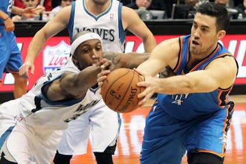 Dante Cunningham and Nick Collison fought for control of the ball.