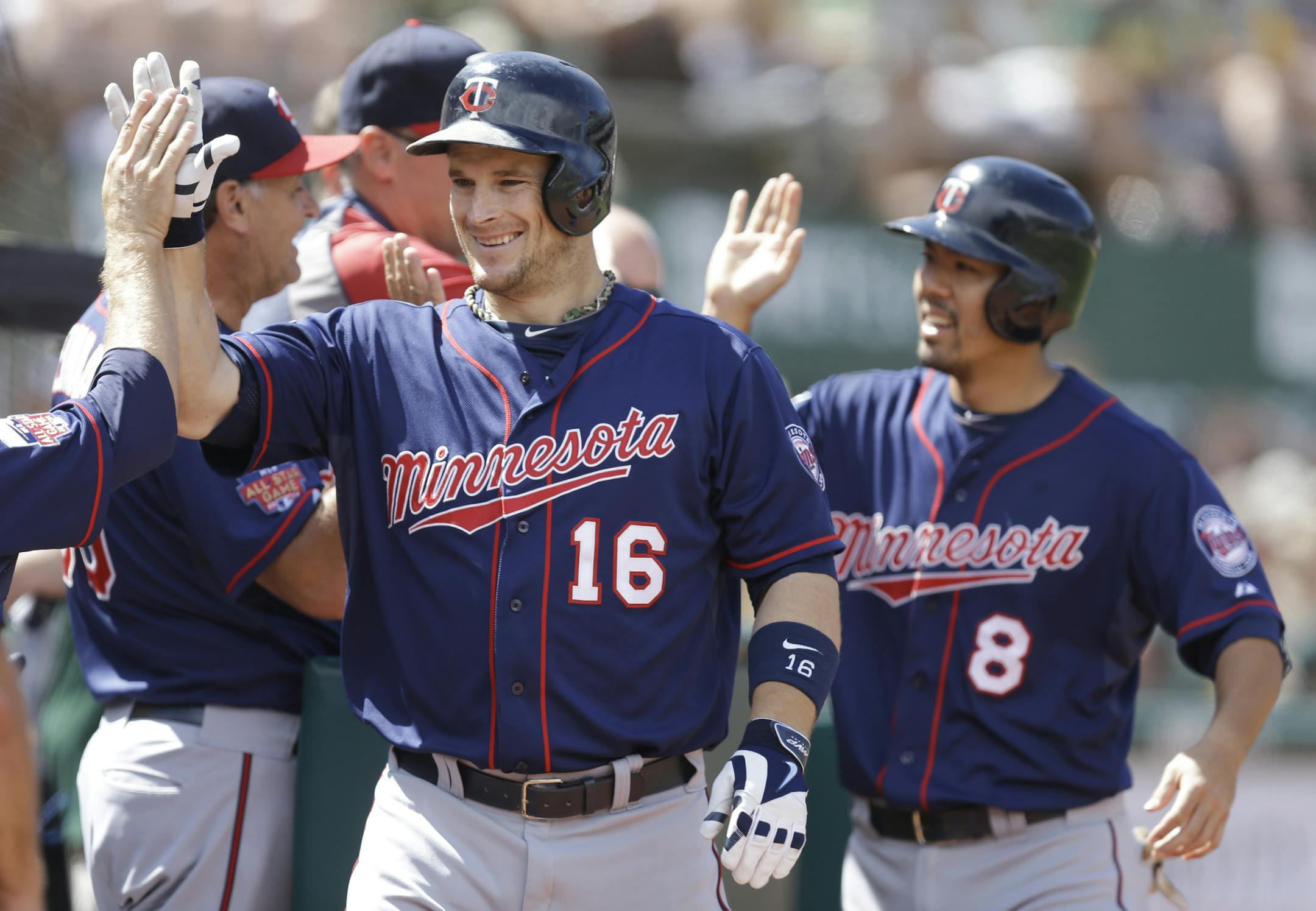 Josh Willingham (16) and Kurt Suzuki came through with big hits as the Twins broke the game open in the eighth Sunday.