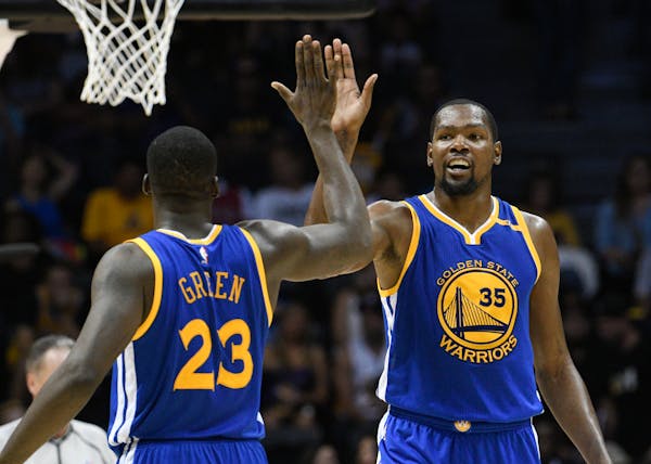 The Golden State Warriors are the new guys in the black hats now that they've added free-agent signee Kevin Durant (right) to a team that won a record