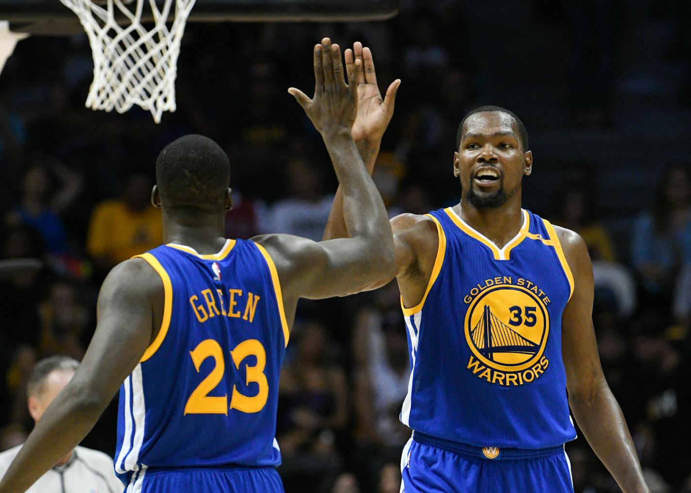 The Golden State Warriors are the new guys in the black hats now that they've added free-agent signee Kevin Durant (right) to a team that won a record 73 regular-season games last season.