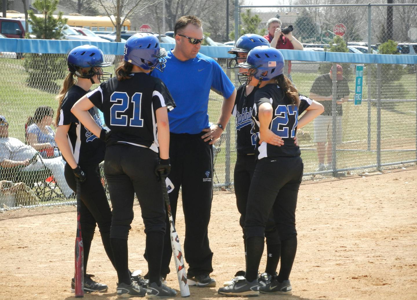 Eastview coach Trevor Monroe discussed strategy with, from left, Melissa Barry, Rachel Young, Hailey Monroe and Kara Sjostrom during a recent game.