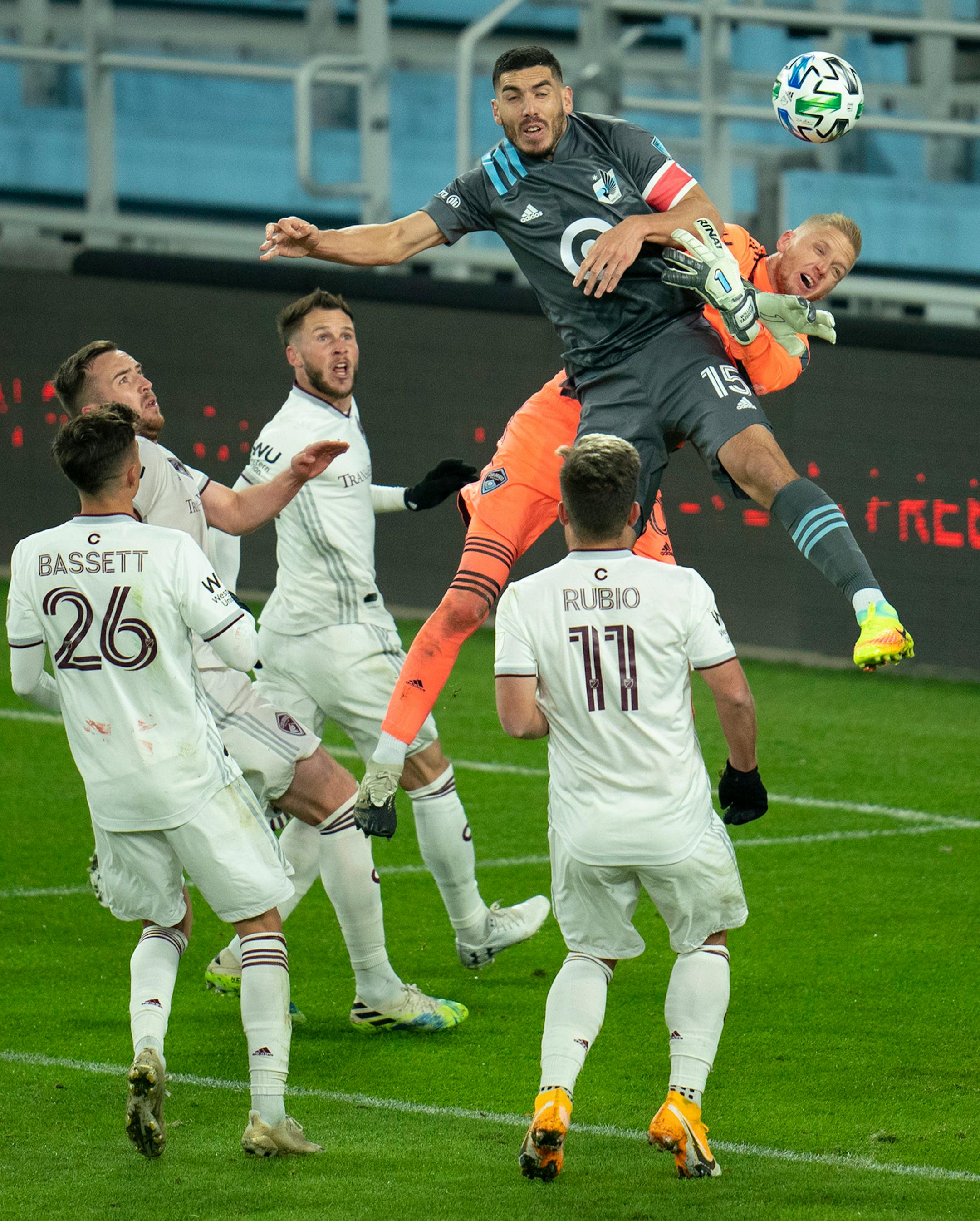 Minnesota United defender Michael Boxall (15) tried to deflect a first half direct kick while Colorado Rapids goalkeeper William Yarbrough (50) defended.