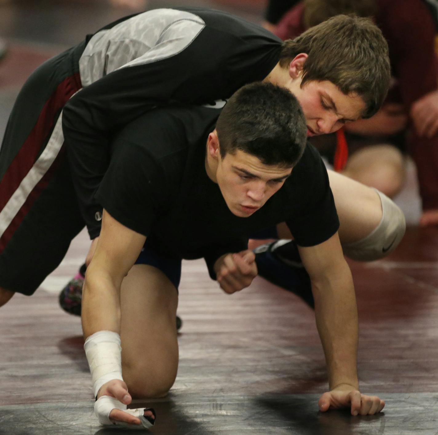 At Anoka H.S., Tyler Eischens and Calvin Germinaro(cast) are some of the wrestlers expected to be big parts of the drive for a state championship .] Richard Tsong-Taatarii/rtsong-taatarii@startribune.com