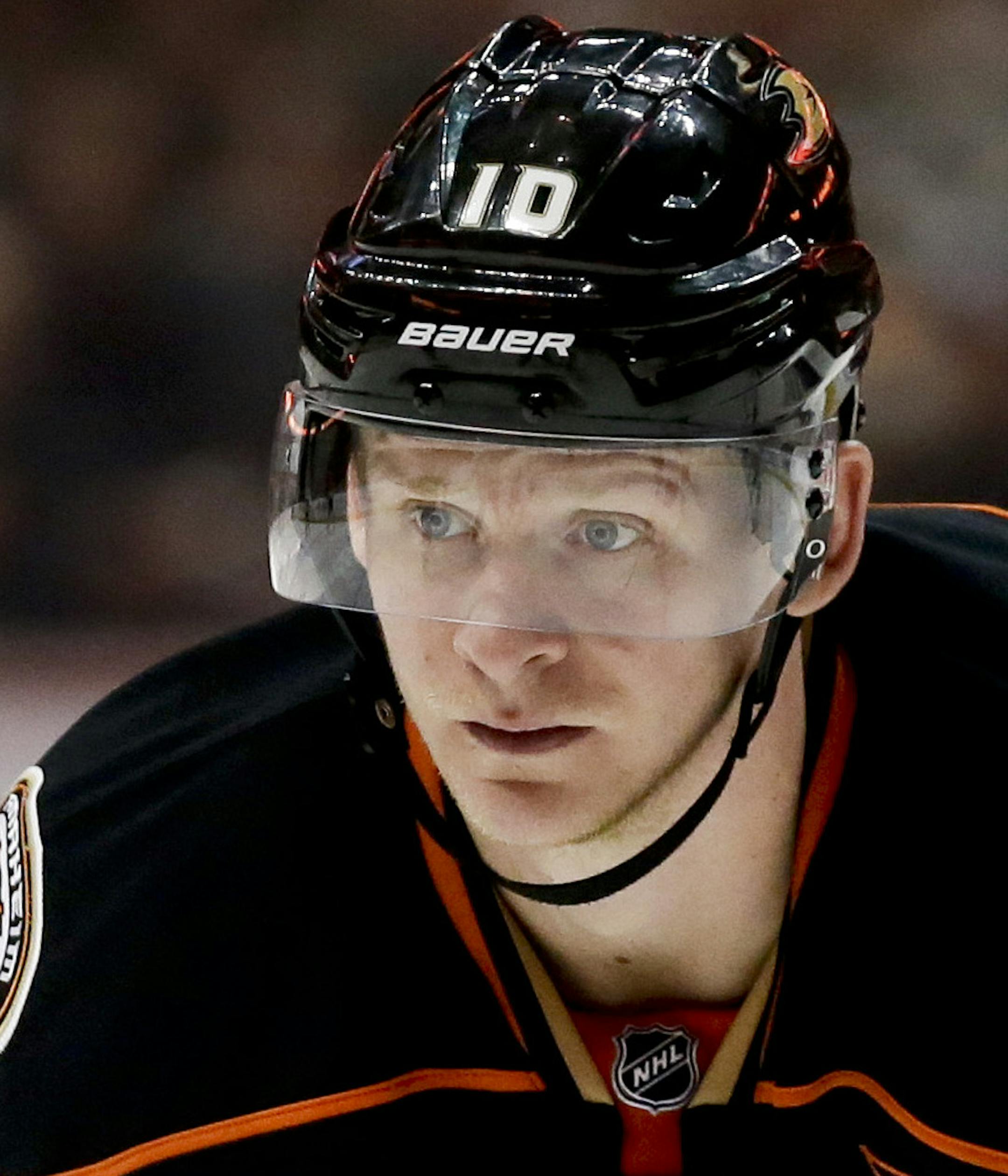 Anaheim Ducks right wing Corey Perry lines up against the Buffalo Sabres during the second period of an NHL hockey game in Anaheim, Calif., Wednesday, Oct. 22, 2014. (AP Photo/Chris Carlson)