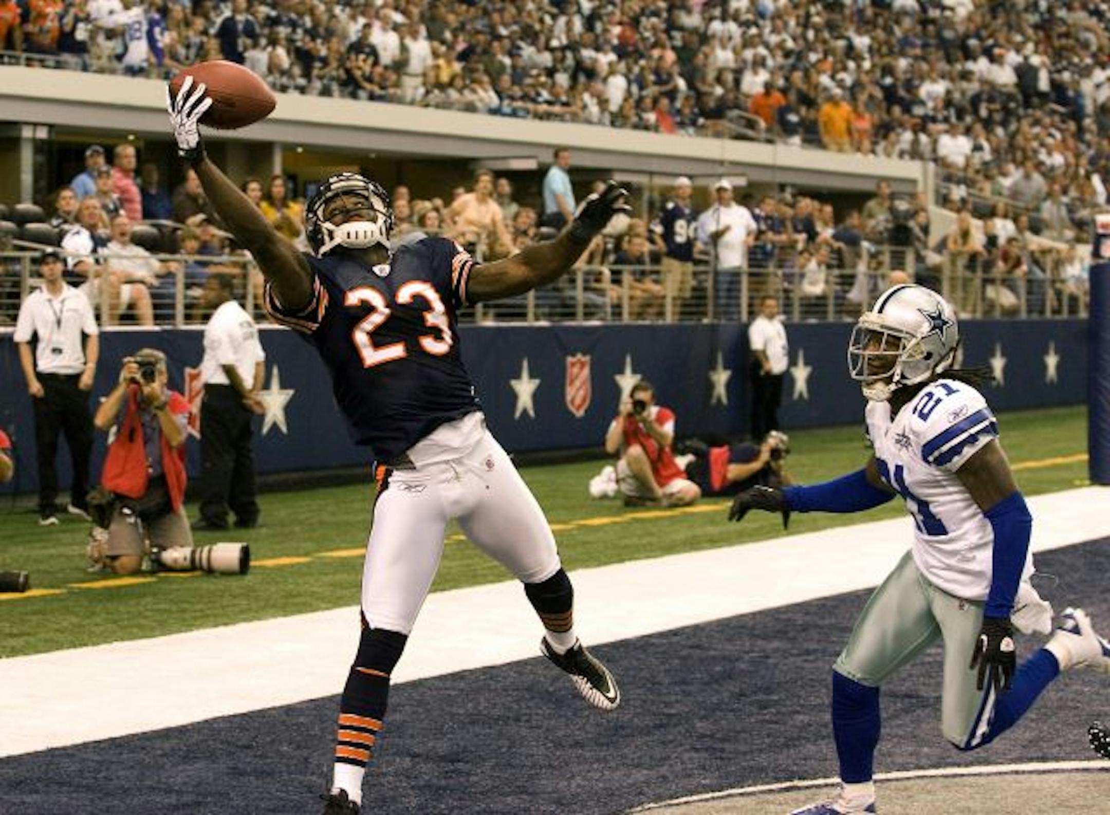Chicago Bears wide receiver Devin Hester pulls down a touchdown catch against Dallas Cowboys cornerback Mike Jenkins in the first half at Cowboys Stadium in Arlington, Texas, Sunday, September 19, 2010. The Bears defeated the Cowboys, 27-20.