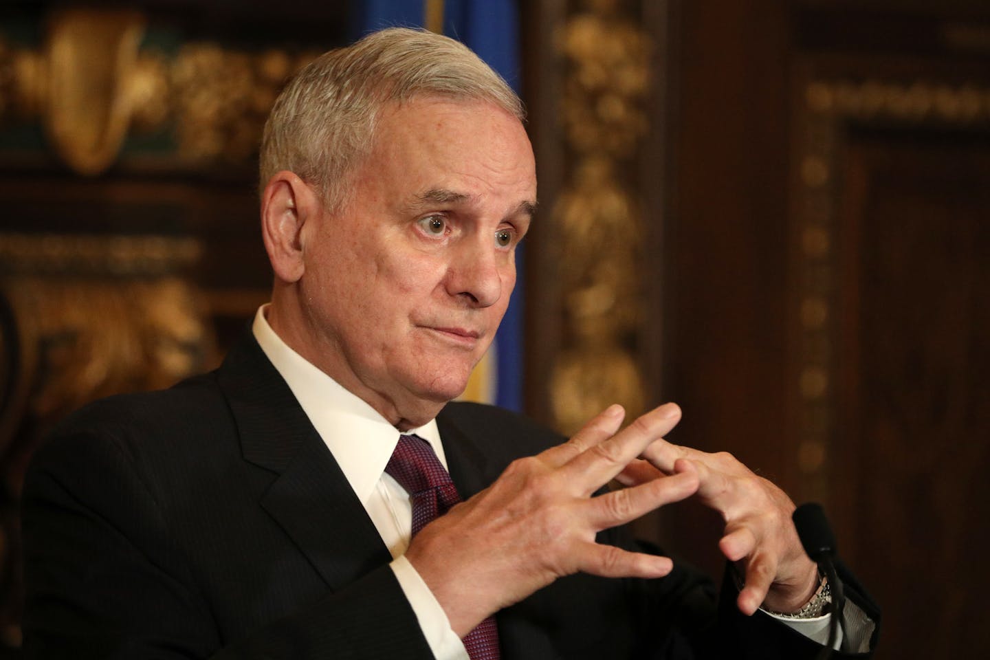 Gov. Mark Dayton emphasized the conflicting interests of the DFL party and the GOP party during Wednesday's press conference.