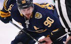 Buffalo Sabres forward Marcus Johansson (90) takes a faceoff during the first period of an NHL hockey game against the Ottawa Senators, Tuesday, Jan. 