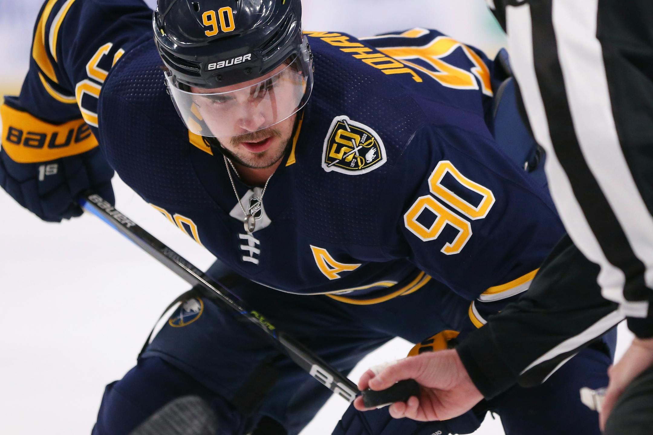 Buffalo Sabres forward Marcus Johansson (90) takes a faceoff during the first period of an NHL hockey game against the Ottawa Senators, Tuesday, Jan. 28, 2020, in Buffalo, N.Y. (AP Photo/Jeffrey T. Barnes)