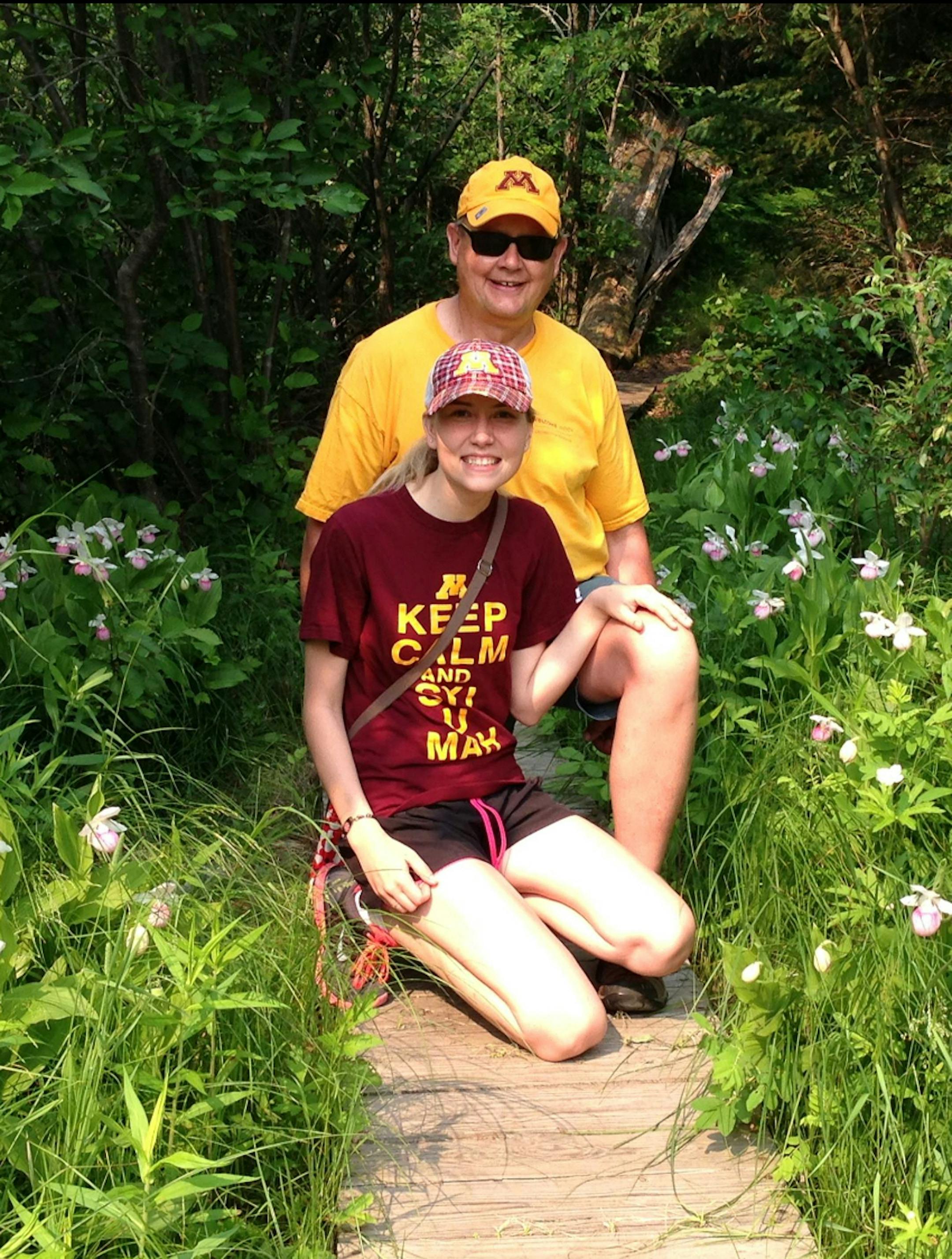 Peter Moe and his family, including his daughter Sharon, camp up north and look for orchids in bloom, such as the showy lady's slipper. Provided photo