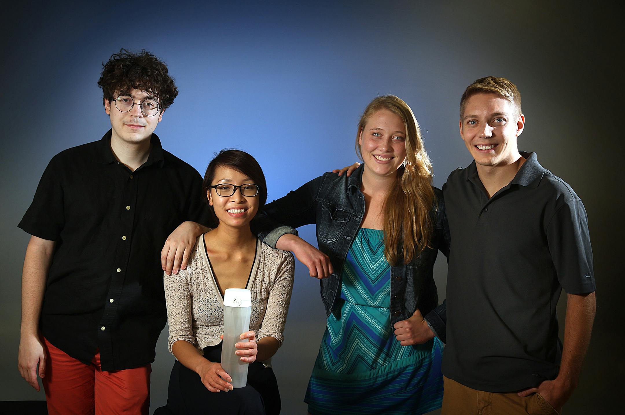 Entrepreneur Nadya Nguyen (second from left), a University of Minnesota business school graduate, has won a Techstars award and raised nearly $500,000 for her HidrateMe small business that incorporates body sensors and a "smart" water bottle that tracks water intake through the day and reminds the owner to drink. With Nguyen are co-founders Alexander Hambrock (left), Alexandra Feeken (second from right) and Coleman Iverson. ] JIM GEHRZ ï james.gehrz@startribune.com / Minneapolis, MN / June