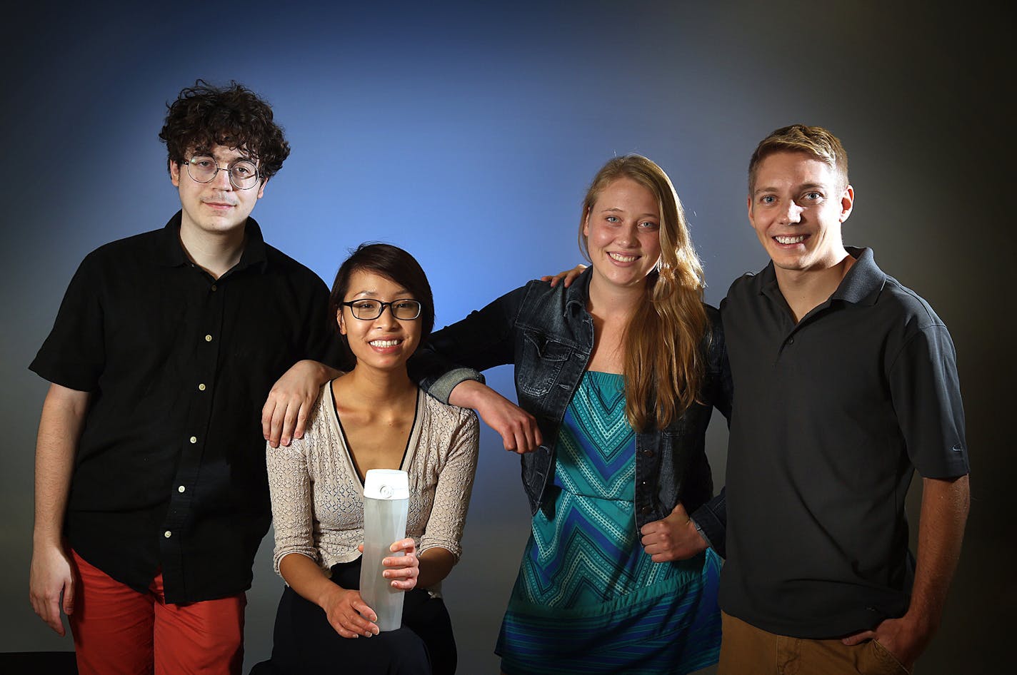 Entrepreneur Nadya Nguyen (second from left), a University of Minnesota business school graduate, has won a Techstars award and raised nearly $500,000 for her HidrateMe small business that incorporates body sensors and a "smart" water bottle that tracks water intake through the day and reminds the owner to drink. With Nguyen are co-founders Alexander Hambrock (left), Alexandra Feeken (second from right) and Coleman Iverson. ] JIM GEHRZ &#xef; james.gehrz@startribune.com / Minneapolis, MN / June