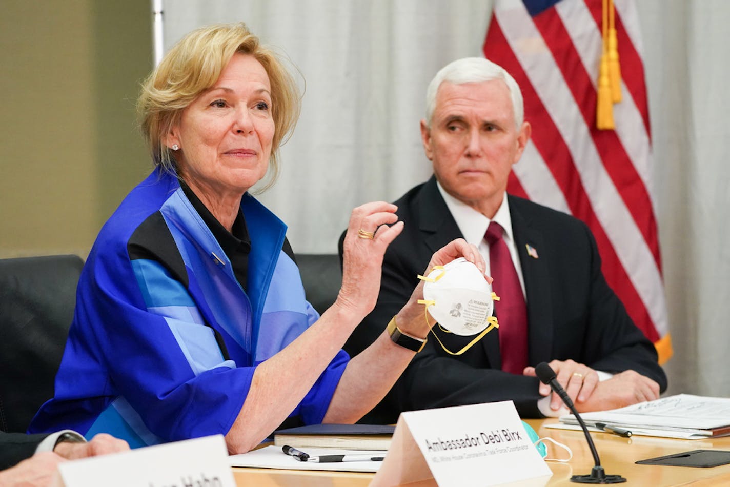 Dr. Deborah Birx, ambassador and White House coronavirus response coordinator, held a 3M N95 mask, with Vice President Mike Pence at 3M in Maplewood on Thursday, March 5, 2020.