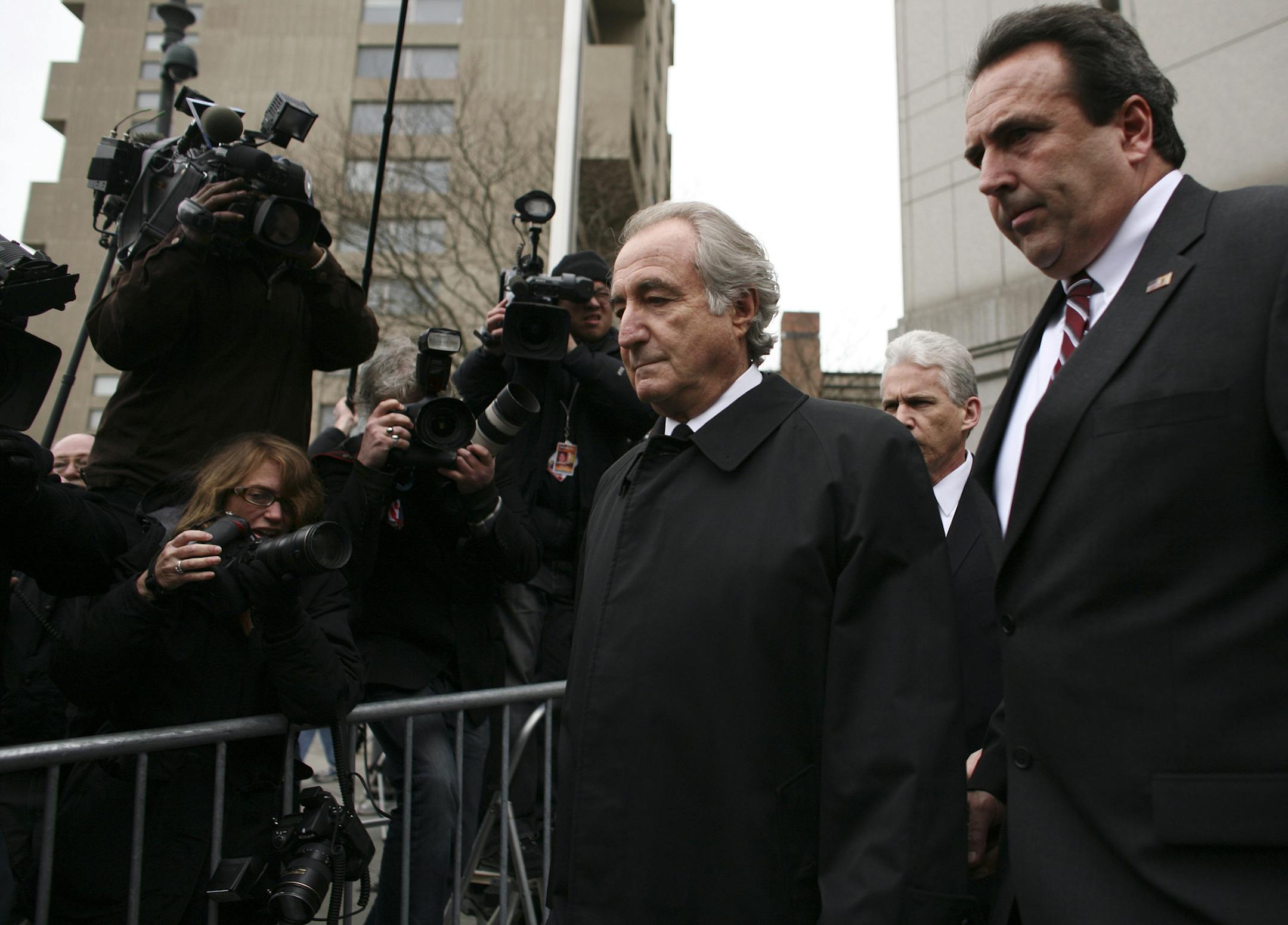 FILE -- Bernard Madoff, left, after a bail hearing in New York on May 8, 2009. Victims of Madoff, the architect of one of Wall Street&#x2019;s largest frauds, will receive another $504 million, proceeds from assets that the government seized after Madoff&#x2019;s financial firm collapsed a decade ago, the Justice Department said. (Michael Appleton/The New York Times) ORG XMIT: XNYT7